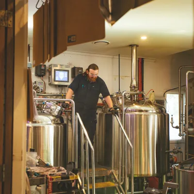 a person standing in a kitchen