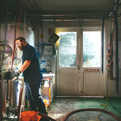 a person standing in front of a bicycle