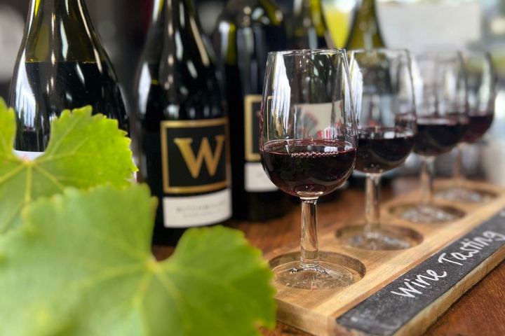 a close up of a bottle of wine on a table