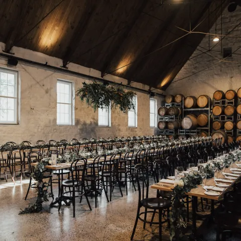 a row of wooden benches sitting on top of a table