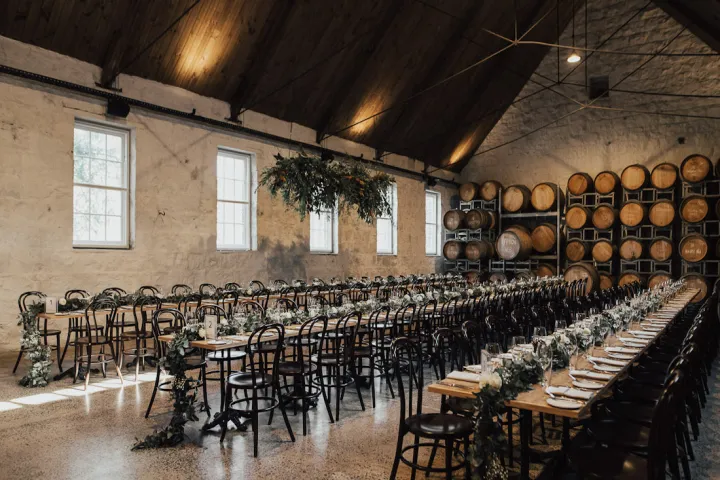 a row of wooden benches sitting on top of a table