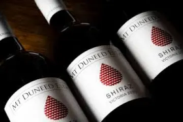 an empty bottle on a table