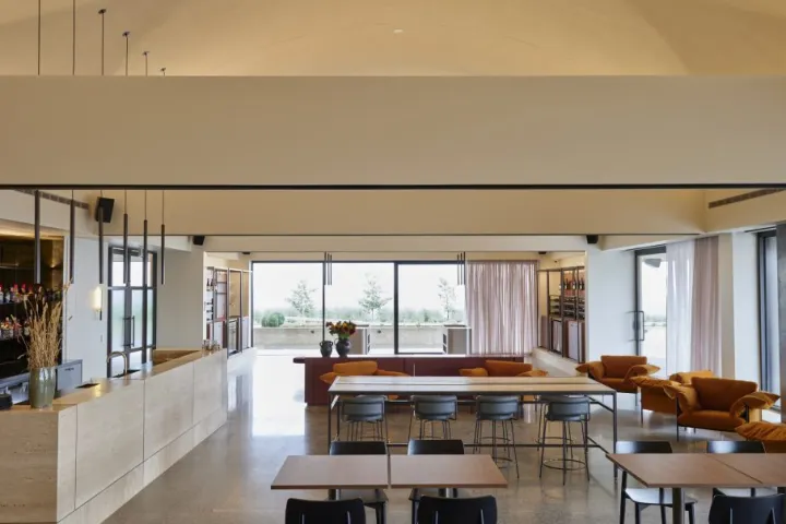 a room filled with furniture and a large window